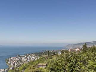 Enjoy breathtaking views from this stunning property! This home offers a serene escape with panoramic vistas of the lake and surrounding landscape.