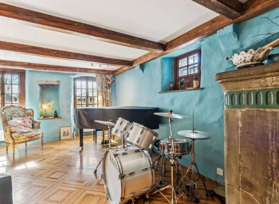 Step into this charming home featuring a unique blend of rustic and modern elements.