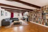 Step into this inviting living room featuring a spacious sectional sofa perfect for relaxation and entertainment.