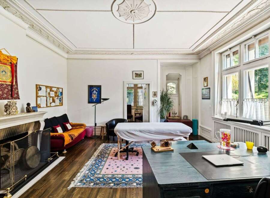 Discover the tranquility of this unique property, featuring a spacious room perfect for a home office or a serene retreat.