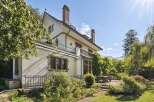 Discover the charm of this stunning property, featuring a beautifully designed exterior and lush landscaping.