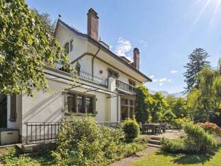Discover the charm of this stunning property, featuring a beautifully designed exterior and lush landscaping.