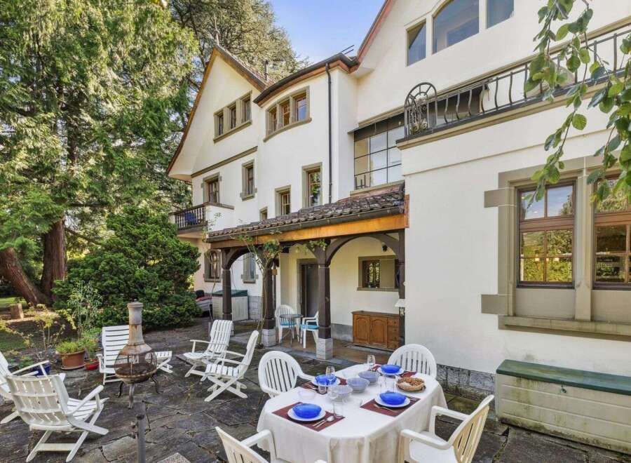 Discover the charm of this stunning property, featuring a beautifully designed outdoor dining area perfect for entertaining.