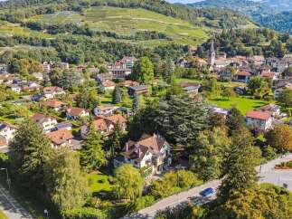 Nestled in a picturesque landscape, this charming property offers a serene escape.