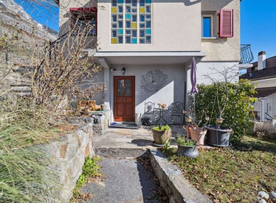 Discover the charm of this inviting property, featuring a beautifully designed facade and a welcoming entrance.