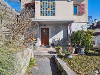 Discover the charm of this inviting property, featuring a beautifully designed facade and a welcoming entrance.