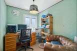 This cozy home office features a stylish desk setup, perfect for productivity.