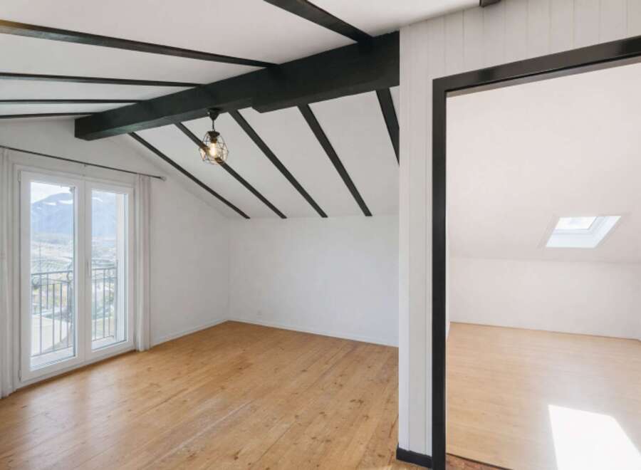 This stunning property boasts a unique architectural design with exposed beams and a bright, airy atmosphere.
