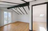 This stunning property boasts a unique architectural design with exposed beams and a bright, airy atmosphere.