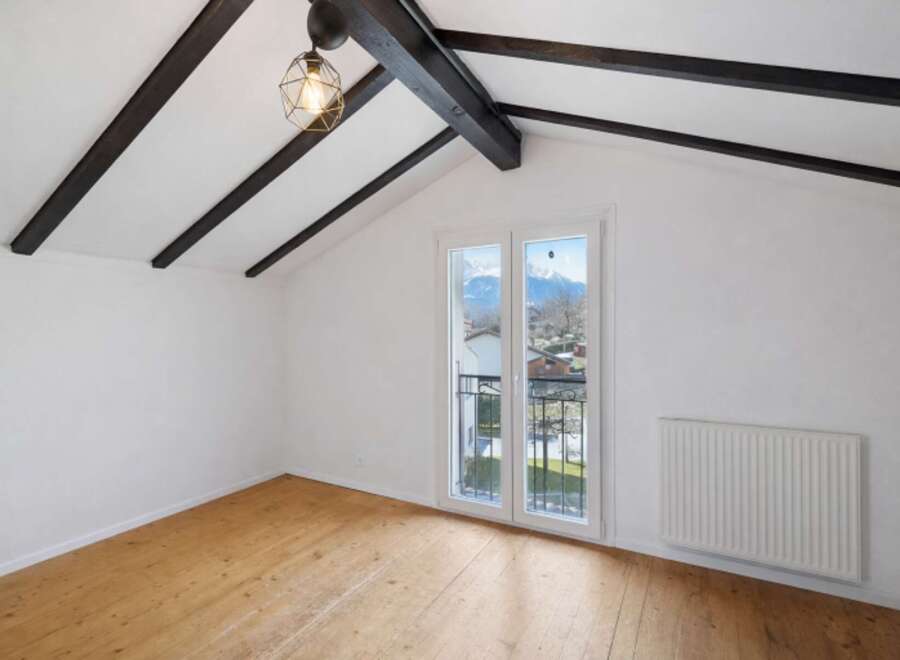 This charming property boasts a bright and airy interior with a stunning view.