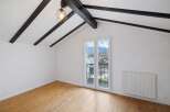 This charming property boasts a bright and airy interior with a stunning view.