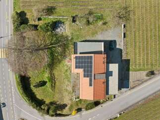 Discover this charming property featuring a modern design and solar panels, perfect for sustainable living.
