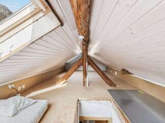 Discover the charm of this unique attic space, perfect for a cozy retreat or creative studio.