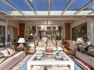 Step into a sun-drenched sanctuary with this stunning property, boasting a breathtaking glass ceiling that floods the space with natural light.