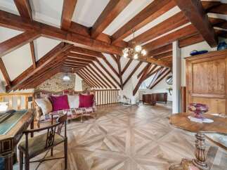 Step into luxury with this stunning property featuring a unique architectural design.