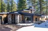 This stunning modern home seamlessly blends with its natural surroundings.
