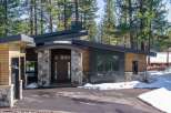 This stunning modern home seamlessly blends with its natural surroundings, offering a tranquil retreat.