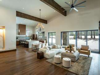 Experience luxury living in this stunning property, featuring a spacious open-concept design perfect for entertaining.