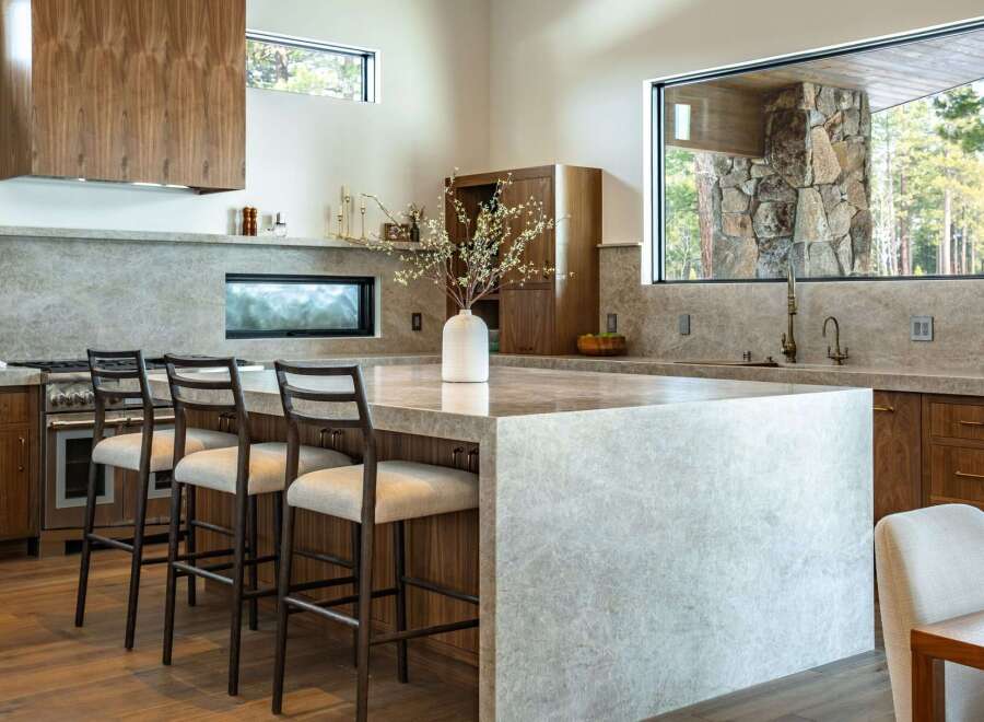 This stunning kitchen boasts a modern design with high-end finishes.
