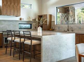 This stunning kitchen boasts a modern design with high-end finishes.