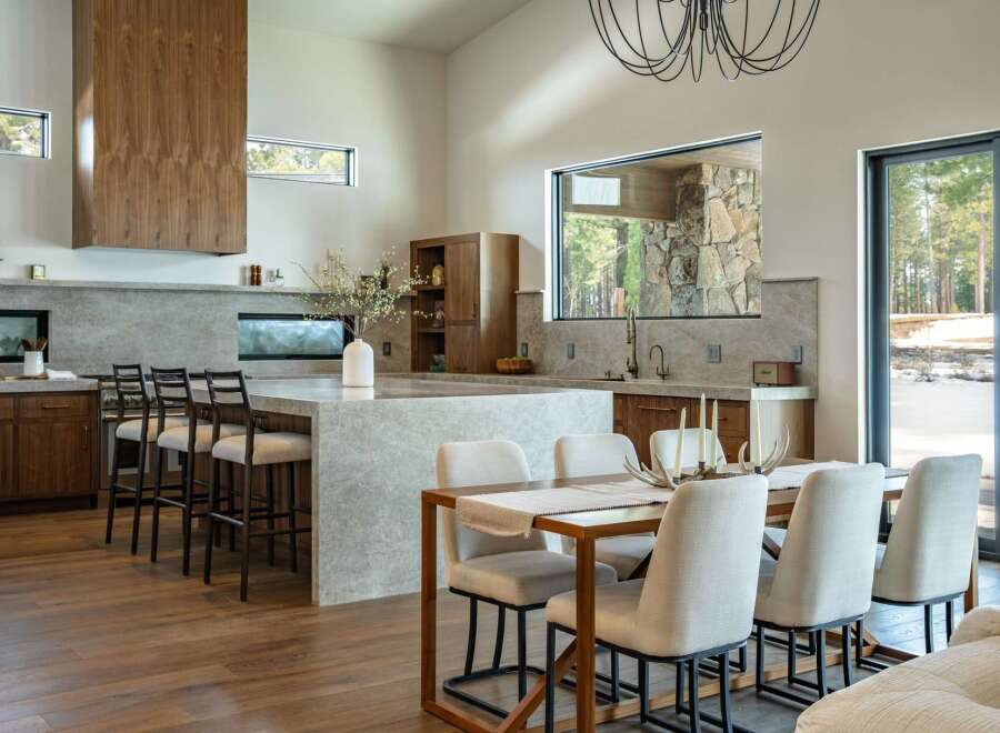 Experience luxury living in this stunning kitchen, featuring a spacious island perfect for entertaining.