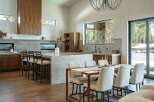 Experience luxury living in this stunning kitchen, featuring a spacious island perfect for entertaining.