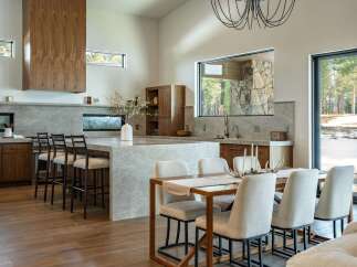 Experience luxury living in this stunning kitchen, featuring a spacious island perfect for entertaining.
