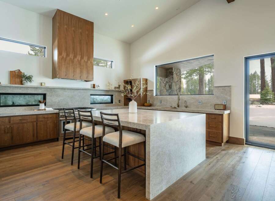 This stunning kitchen boasts a modern design with high-end finishes.