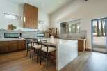 This stunning kitchen boasts a modern design with high-end finishes.