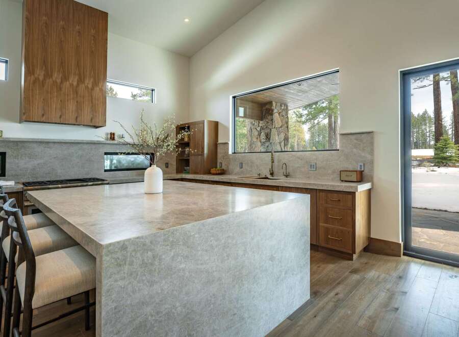 This stunning kitchen boasts a modern design with high-end finishes.