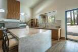 This stunning kitchen boasts a modern design with high-end finishes.