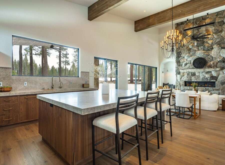 Experience luxury living in this stunning property featuring a gourmet kitchen with a spacious island and modern appliances.