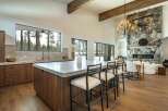 Experience luxury living in this stunning property featuring a gourmet kitchen with a spacious island and modern appliances.