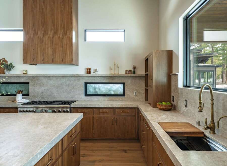 This stunning kitchen boasts a modern design with high-end finishes.