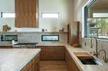 This stunning kitchen boasts a modern design with high-end finishes.