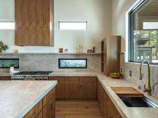 This stunning kitchen boasts a modern design with high-end finishes.