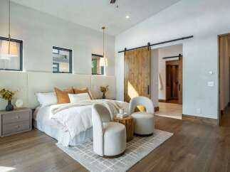 Step into luxury with this stunning bedroom featuring a modern design and elegant finishes.