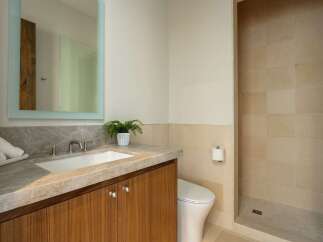 This stunning bathroom boasts a modern design with high-end finishes.