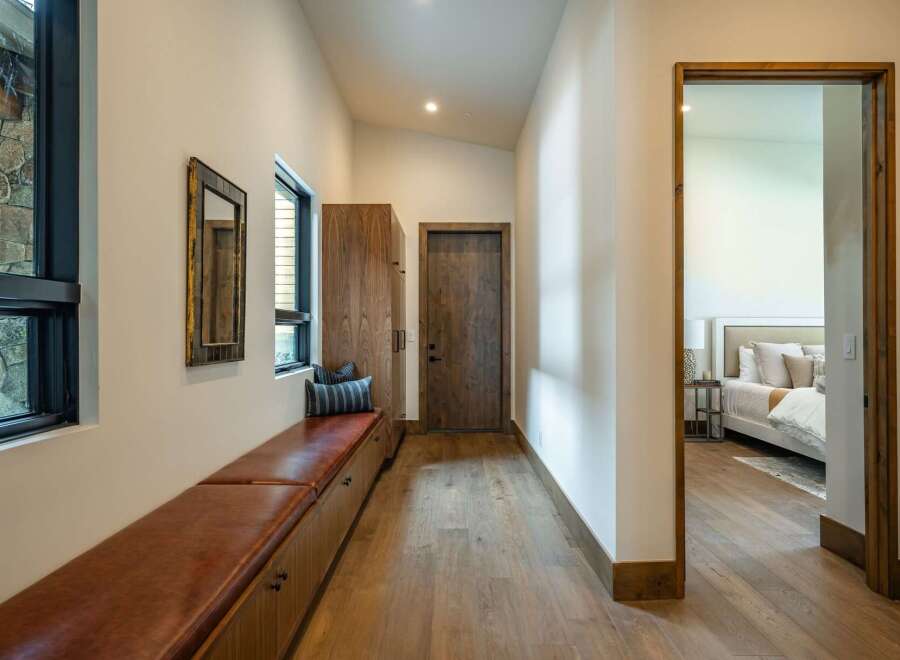 Step into luxury with this stunning property, showcasing a beautifully designed hallway.