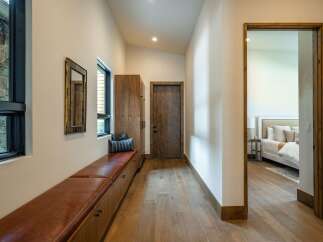 Step into luxury with this stunning property, showcasing a beautifully designed hallway.