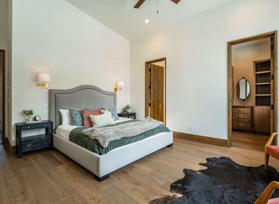 This stunning bedroom boasts a luxurious and inviting atmosphere, perfect for relaxation.