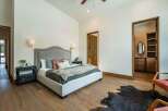This stunning bedroom boasts a luxurious and inviting atmosphere, perfect for relaxation.