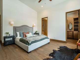 This stunning bedroom boasts a luxurious and inviting atmosphere, perfect for relaxation.