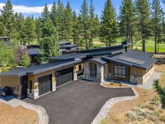 Experience modern luxury in this stunning contemporary home, perfectly situated on a golf course with breathtaking views.