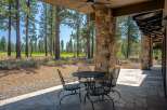 Enjoy outdoor living on this expansive covered patio, perfect for al fresco dining or relaxing with a view.