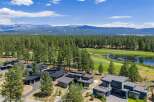 Experience luxury living in this modern architectural masterpiece, nestled amidst a serene golf course and surrounded by a lush pine forest.