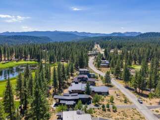 Experience luxury living nestled amidst a pristine pine forest and a championship golf course.