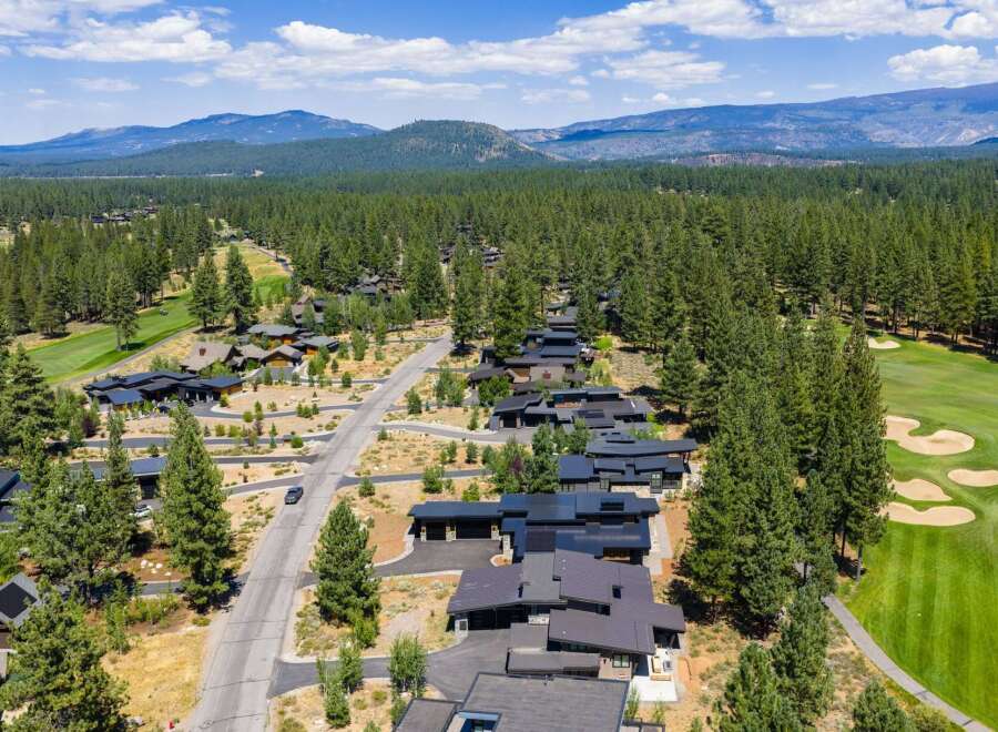 Experience luxury living nestled amidst a pristine pine forest and a championship golf course.
