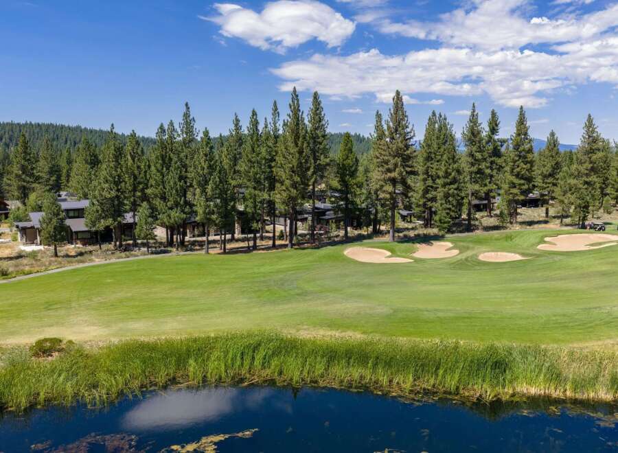 Experience luxury living adjacent to a pristine golf course, offering breathtaking views and unparalleled recreational opportunities.