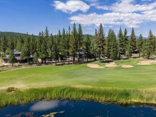 Experience luxury living adjacent to a pristine golf course, offering breathtaking views and unparalleled recreational opportunities.